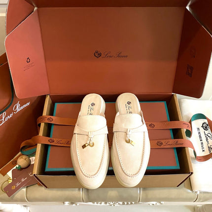 26S LOCK CHARM MULES IN BEIGE SUEDE GOLD HARDWARE