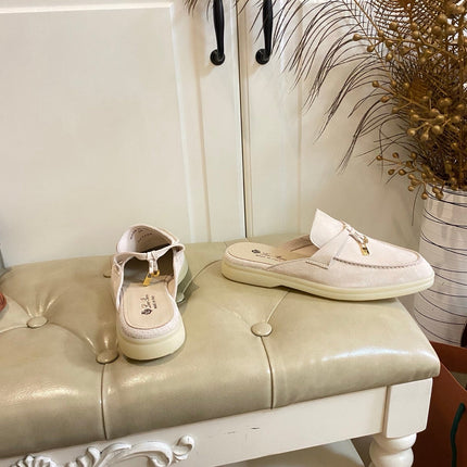 26S LOCK CHARM MULES IN BEIGE SUEDE GOLD HARDWARE